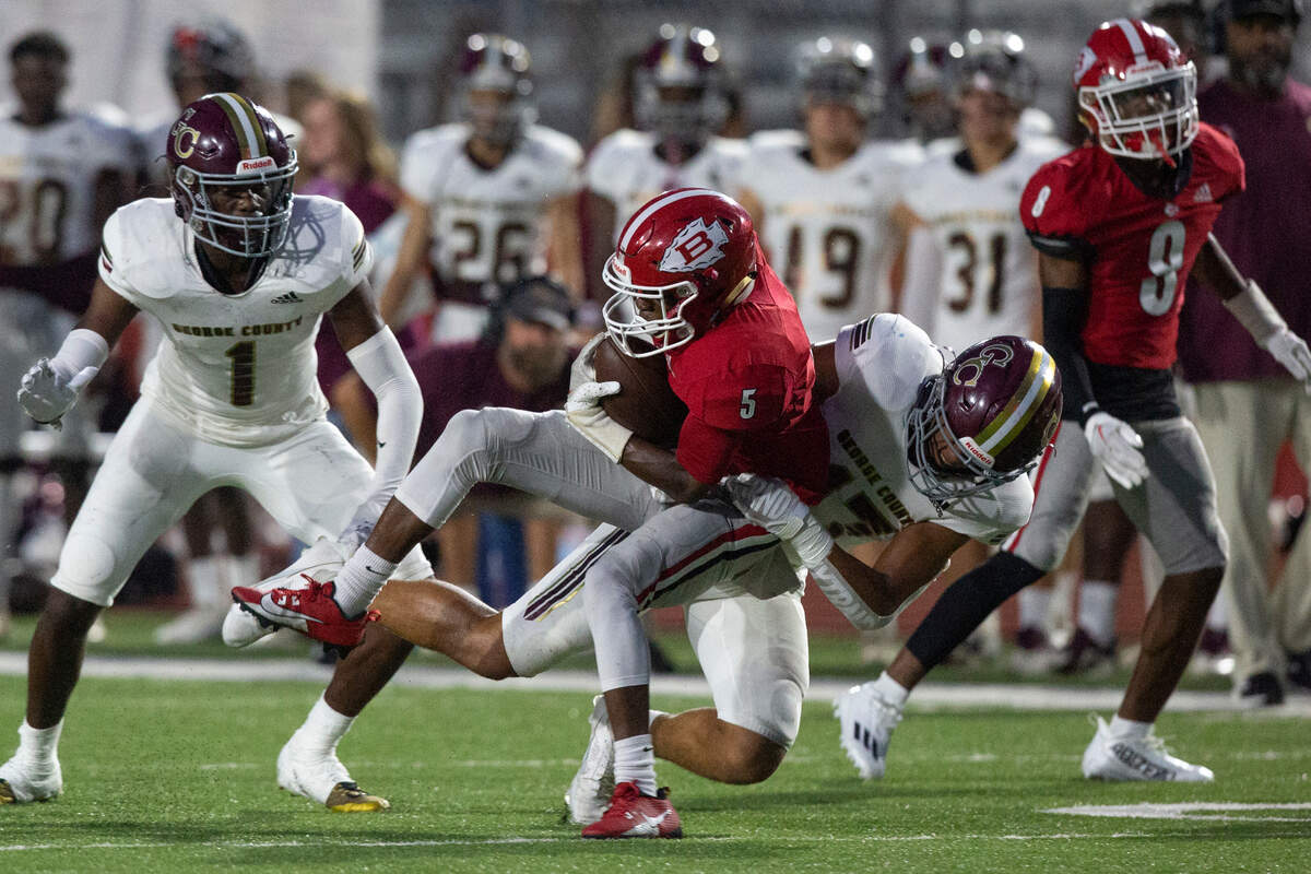 George County’s Casino Little tackles Biloxi’s Tristain Haynes during their game against Biloxi at Biloxi High School on Friday, Sept. 8, 2023.