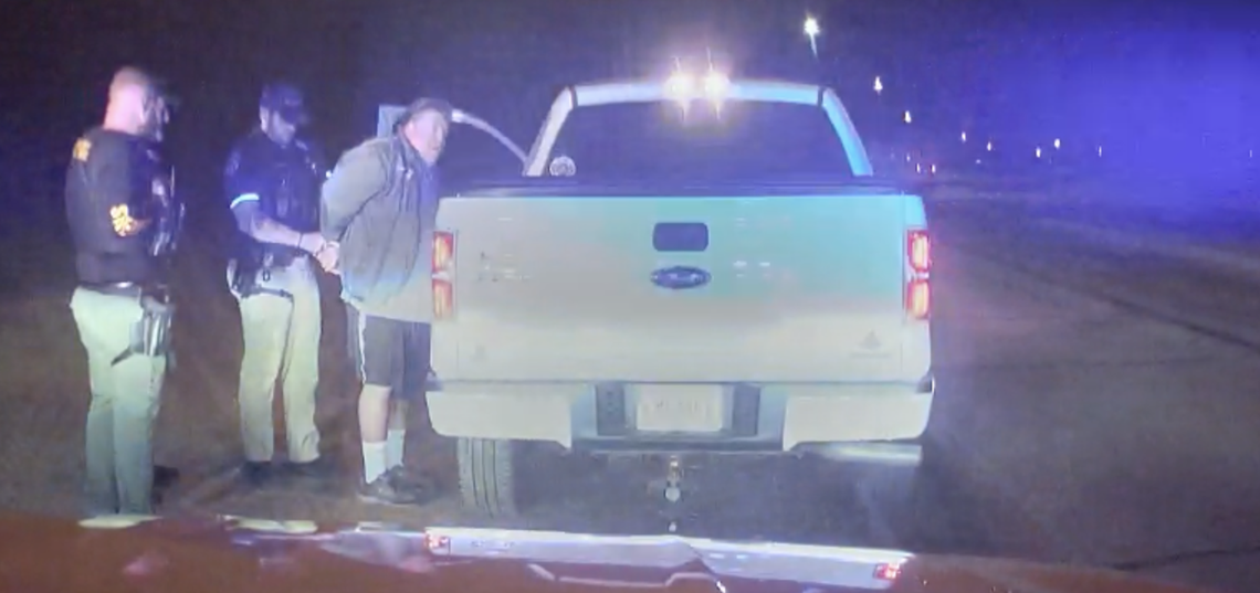 Hancock County sheriff’s deputies arrest Mark Charron of Wisconsin on a misdemeanor trespassing charge that Charron says was later dismissed.