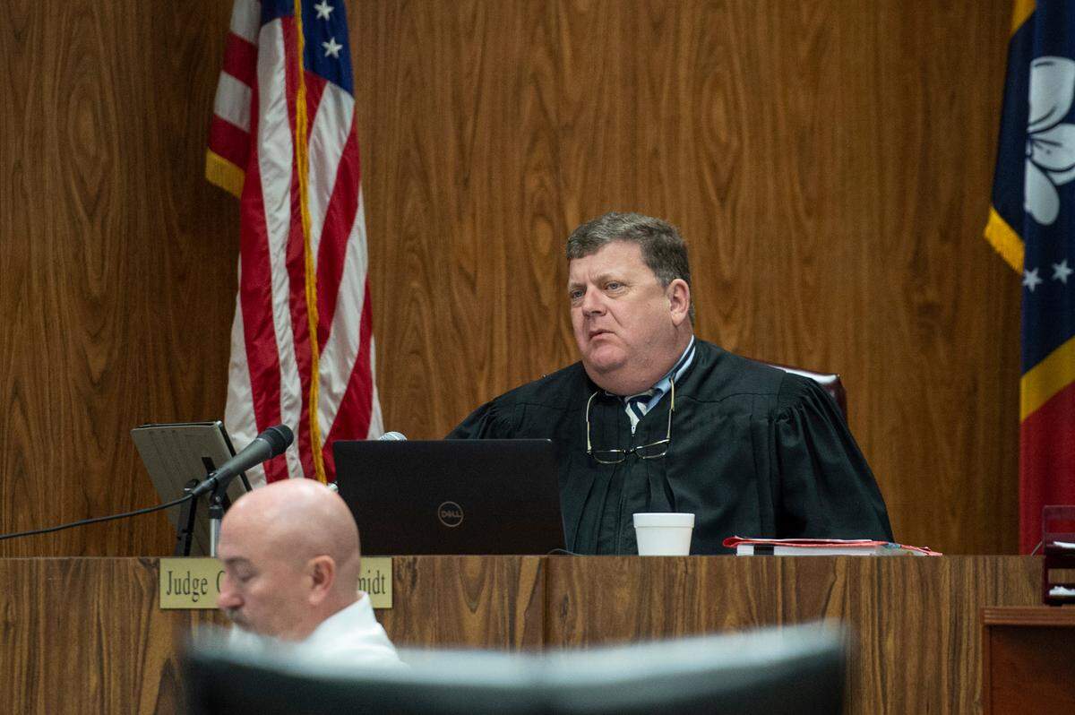 Judge Chris Schmidt listens as attorneys question a witness during the murder trial of Byron Ellison in Gulfport on Tuesday, March 29, 2022.
