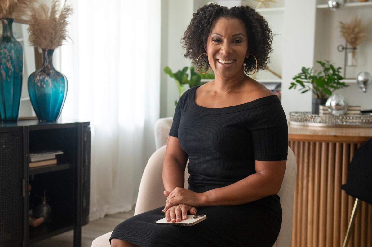Kerri Paul, an entrepreneur, restaurant owner and former Amazing Race contestant, poses for a portrait at her home in Gulfport on Wednesday, Aug. 7, 2024. Paul posts social media content about her children, her parents and her lifestyle under the the social media handle @thekerripaul.