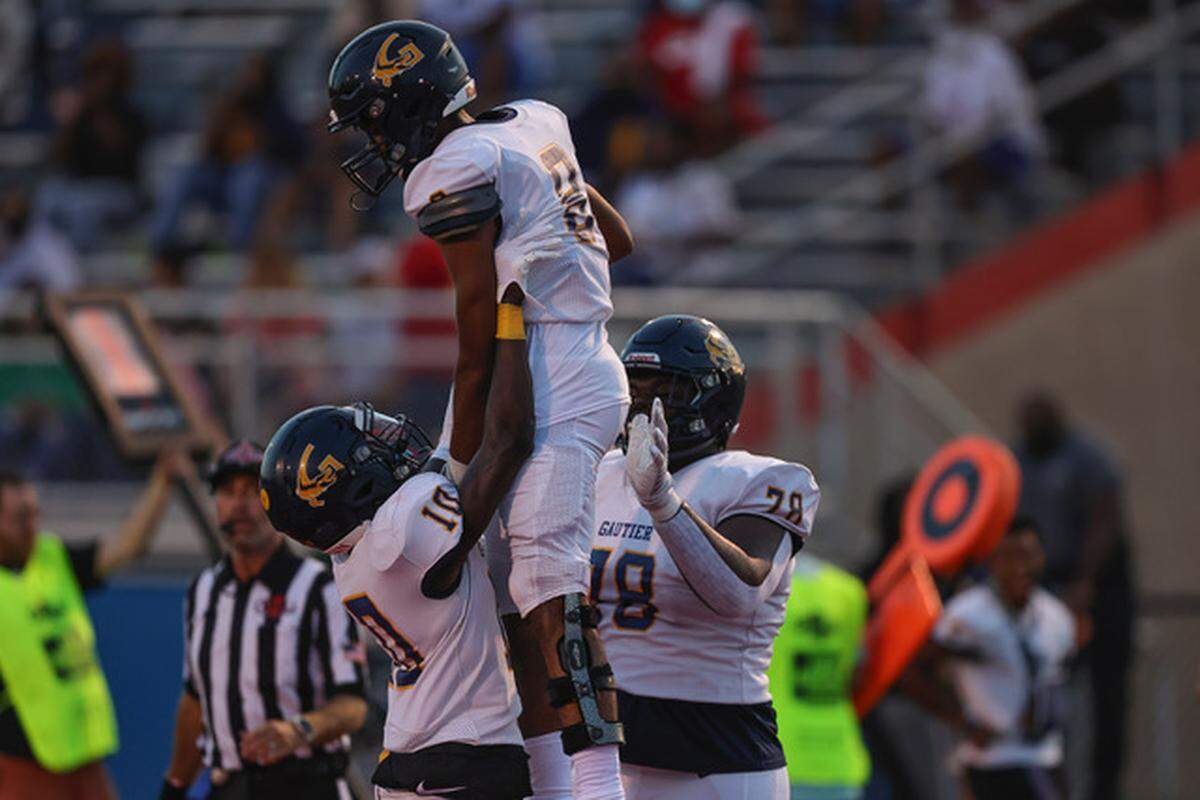 Gautier Gators wide receiver Derrell Ray (8) celebrates a touchdown with teammates during the game between Gautier and Pascagoula in Pascagoula September 3, 2021.