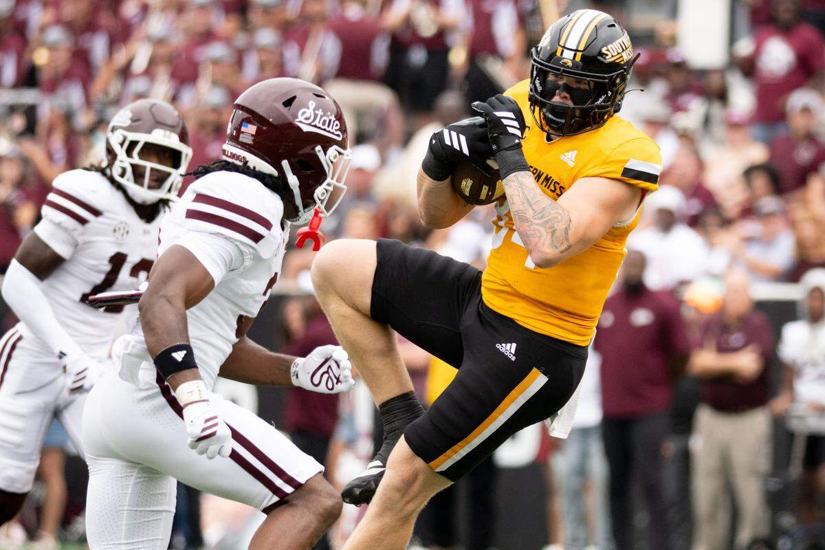 Southern Miss tight end Kadinn Morris (84) catches a pass for a first down Saturday in the Golden Eagles’ loss to Mississippi State.