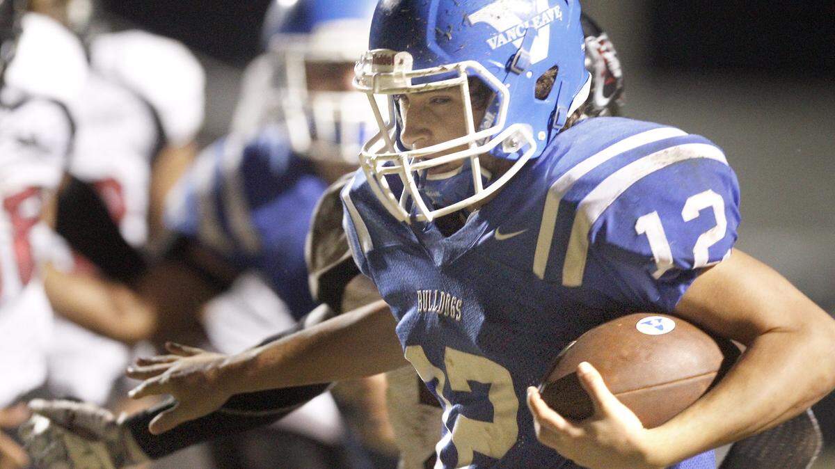 TIM ISBELL/SUN HERALD 
 Vancleave quarterback Parker Bourque scores a touchdown against Lawrence County, Friday, Nov. 20, 2015.
