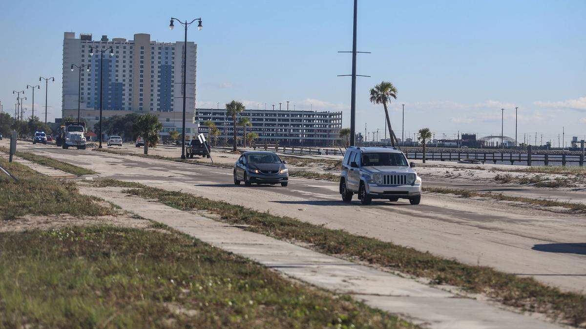 Sand still covered the cleared U.S. 90 in Gulfport Friday, Oct. 30, 2020 from Hurricane Zeta’s wind and powerful storm surge.