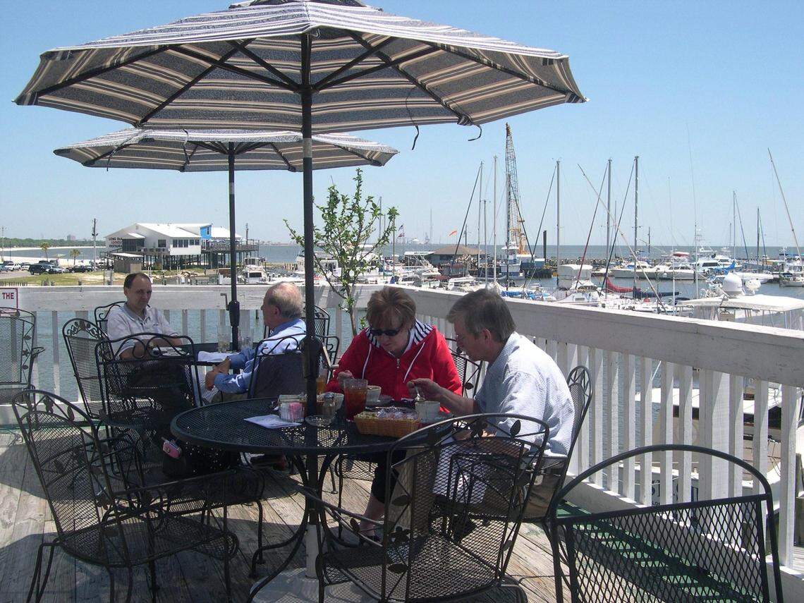 Diners enjoy a meal on the deck overlooking the harbor at Steve’s Marina Restaurant in Long Beach in 2005.