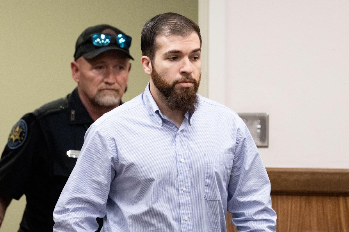 Logan D’Elena walks into the courtroom Thursday at Harrison County Circuit Court.