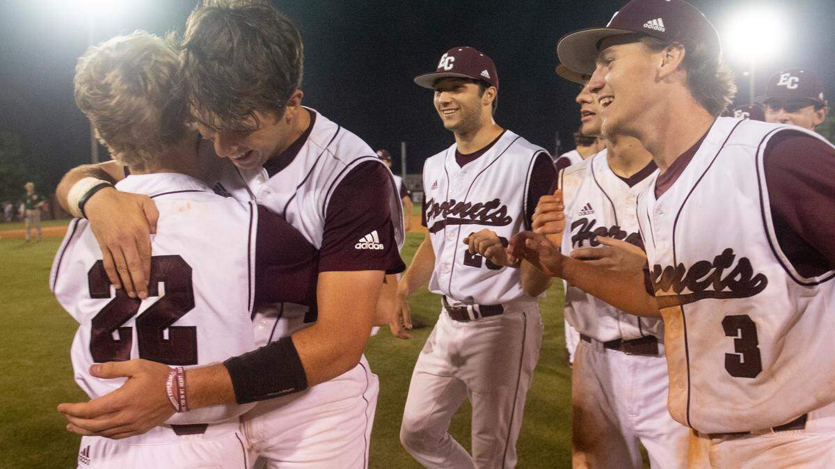 The East Central baseball team celebrates after beating West Jones in the 5A South State championship game at East Central High School in Hurley on Tuesday, May 23, 2023.