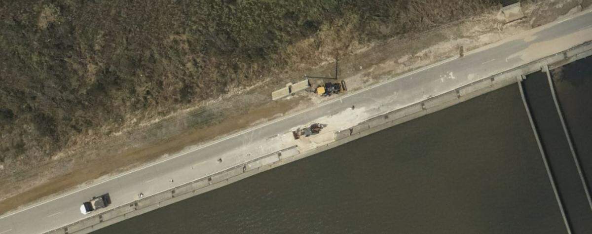 This photo of U.S. 90, west of Buccaneer State Park in Hancock County, on Aug. 30. Sand covers much of the road and a section of concrete wall is out, apparently following a crash.