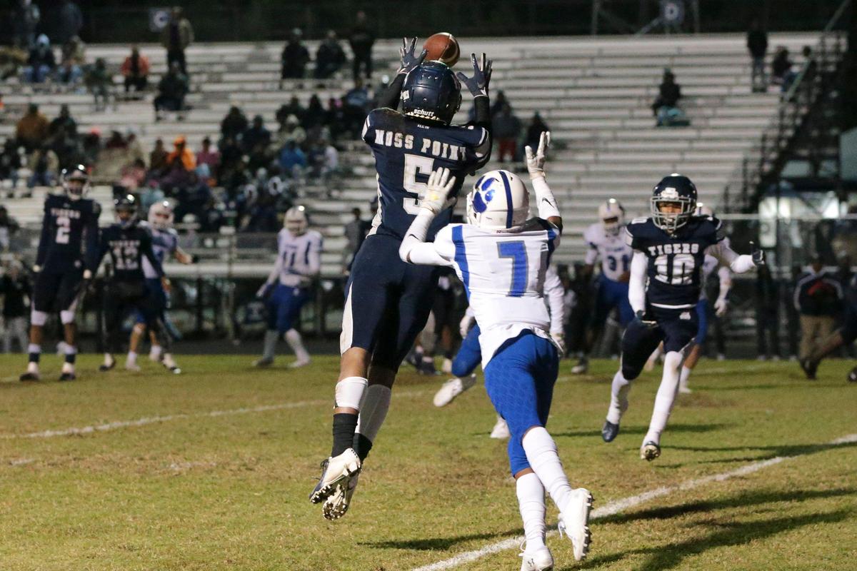 Moss Point wide receiver Larry Simmons (5) catches a pass for a touchdown during the first round 4A playoff game between Moss Point and Stone at Moss Point, Friday, November 8, 2019.