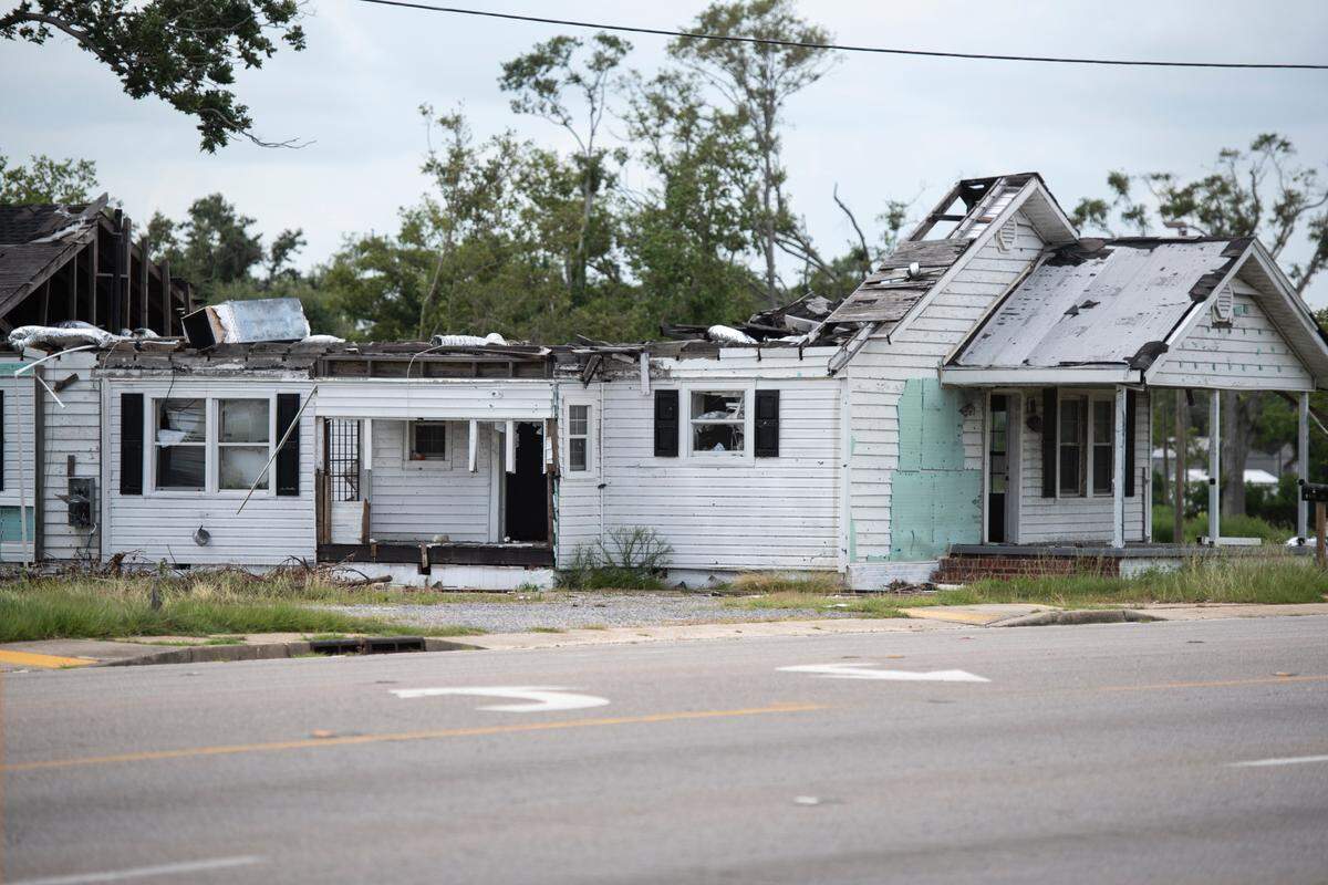 A building on Main Street in Moss Point remains in a state of disrepair on Tuesday, June 18, 2024, one year after a devastating tornado struck the area.