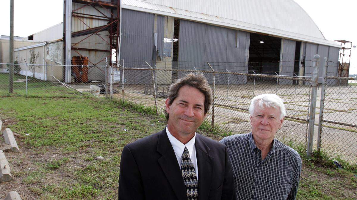 JOHN FITZHUGH/SUN HERALDFrancisco Gonzalez, left, and Tom Simmons had hoped the old WWII-era hangar at the Gulfport-Biloxi International Airport would be the home of the planned Mississippi Aviation Heratage Museum. Because that plan did not work out, the Brown Condor Association, which Gonzalez heads, is asking for the old city-owned Rooms To Go building on Pass Road.
