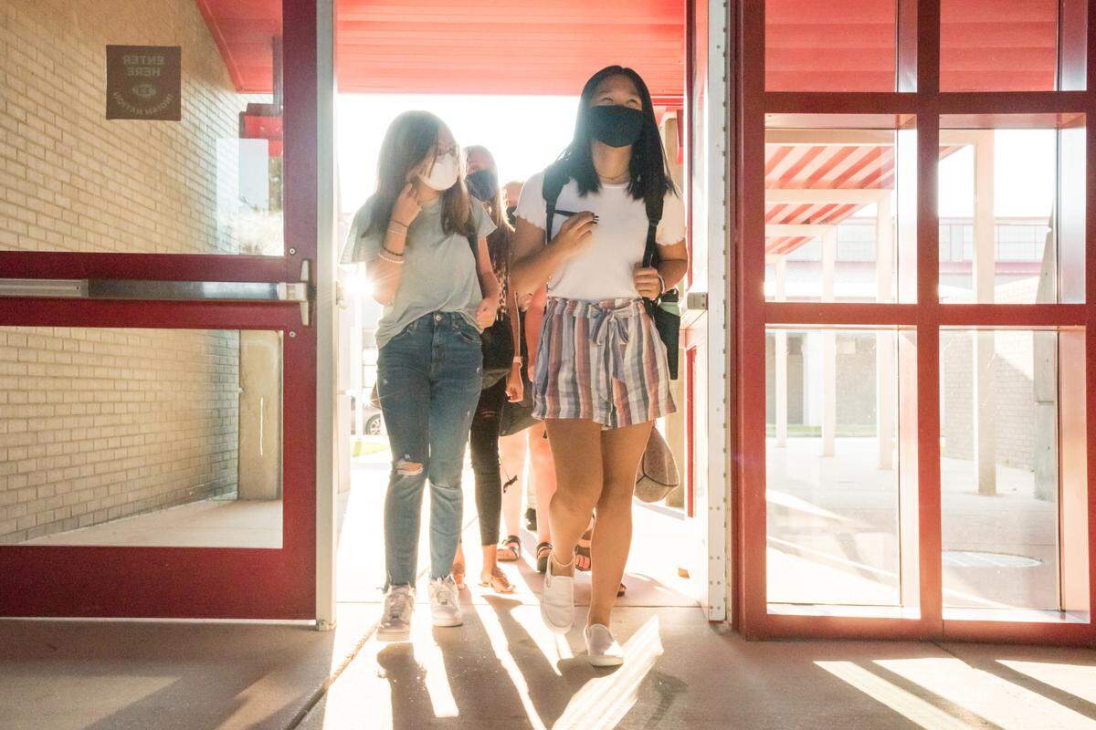 Students entering Biloxi High School on their first day amid the COVID-19 pandemic on August 5th, 2020