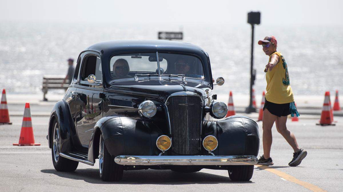 Cruisers arrive at Cruisin’ Central at Centennial Plaza during Cruisin’ the Coast on Tuesday, Oct. 3, 2023.