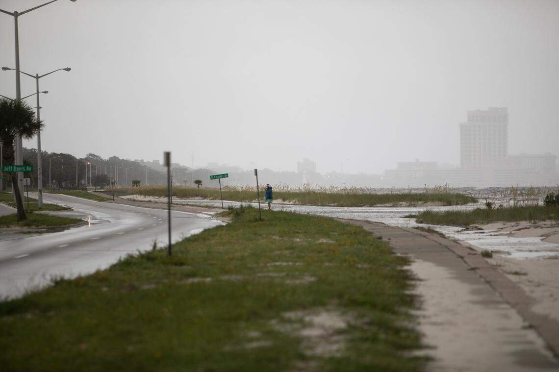 A hazy mist sprays over U.S. 90 in Biloxi on Sunday, ahead of Hurricane Ida’s landfall. Parts of the highway in the area were already impassable with flood water.