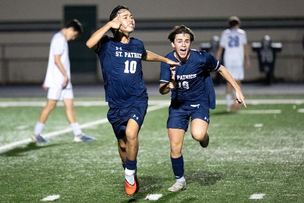 St. Patrick’s Lucas Kurihara (10) celebrates scoring a goal during a soccer game at St. Patrick Catholic High School on Tuesday, Feb. 17, 2026