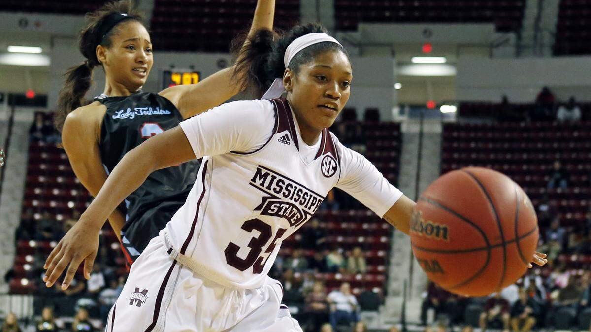 In this Dec. 11, 2014, photograph, Mississippi State forward Victoria Vivians (35) pushes past Louisiana Tech forward Whitney Frazier (2) for a loose ball during an NCAA college basketball game in Starkville, Miss. Undefeated No. 14 Mississippi State has won a school-record 18 straight games to start the season. (AP Photo/Rogelio V. Solis)