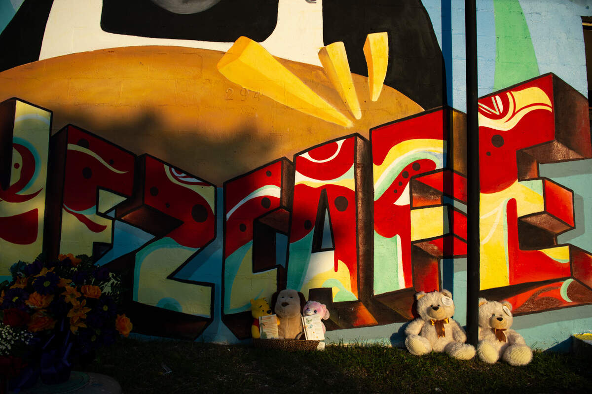 Teddy bears and flowers sit outside the former Inez Cafe in honor of Inez Thomas who owned and worked at the cafe for 40 years on Friday, Oct. 22, 2021.