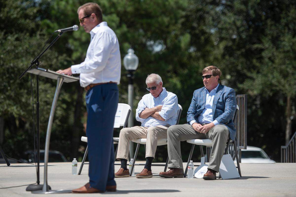 Ocean Springs Mayor Kenny Holloway introduces U.S. Sen Roger Wicker, center, and Gov. Tate Reeves, right, during a program about the anniversary of Hurricane Katrina at Fort Maurepas Park in Ocean Springs on Monday, Aug. 29, 2022. Water covered what is now the park during Hurricane Katrina.