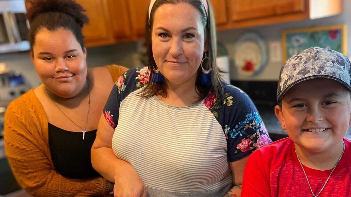 Caroline Davis, also known as @mississippi_kween, with two of her four children. Bubba, pictured on the right, makes frequent appearances in Davis’s TikTok videos.