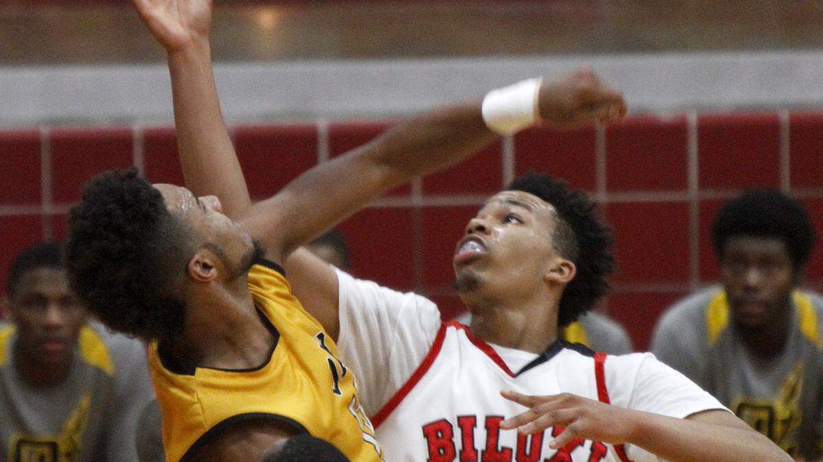 TIM ISBELL/SUN HERALD 
 Biloxi's Fred Ramsey-Thompson, who's averaging 13 points a game, battles Oak Grove's Ashton Pierce. The Indians face Vigor in the MLK Gulf Coast Classic today at the Biloxi Sports Arena.