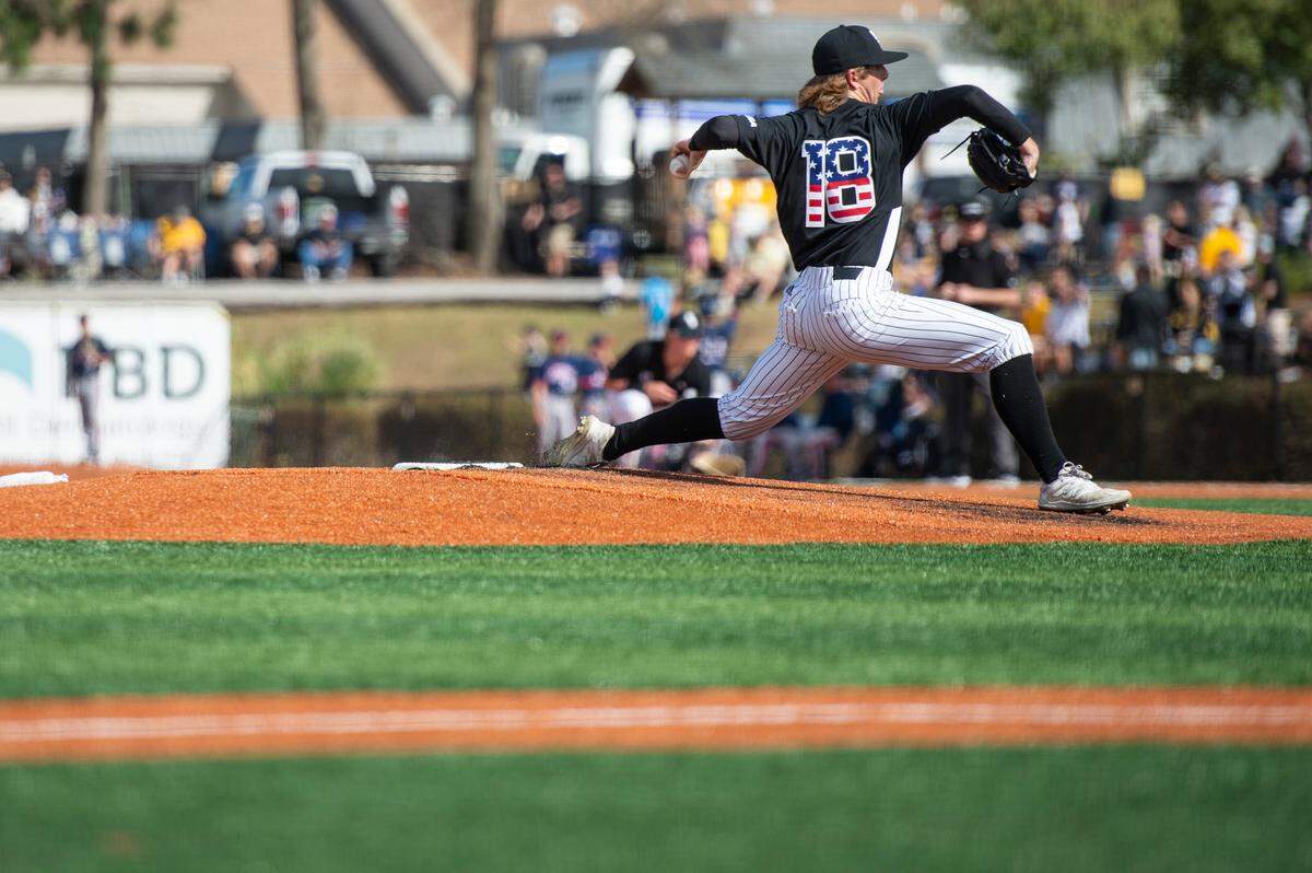 Southern Miss pitcher Dalton Rodgers throws a pitch during a game against Florida Atlantic University at Pete Taylor Park in Hattiesburg on Saturday, March 19, 2022.