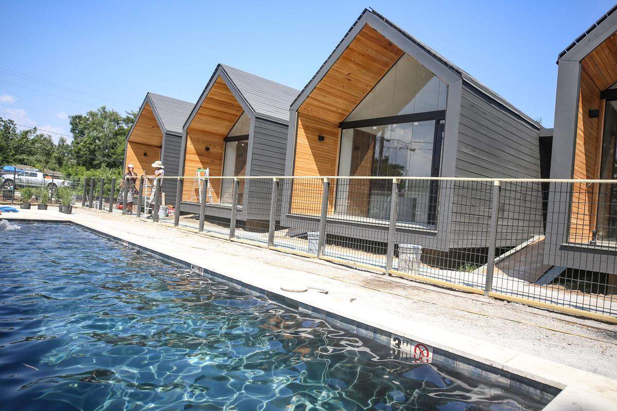 Hotel Beatnik, comprised of four modern, floating cabins overlooking a pool, is part of The Collective in Ocean Springs.