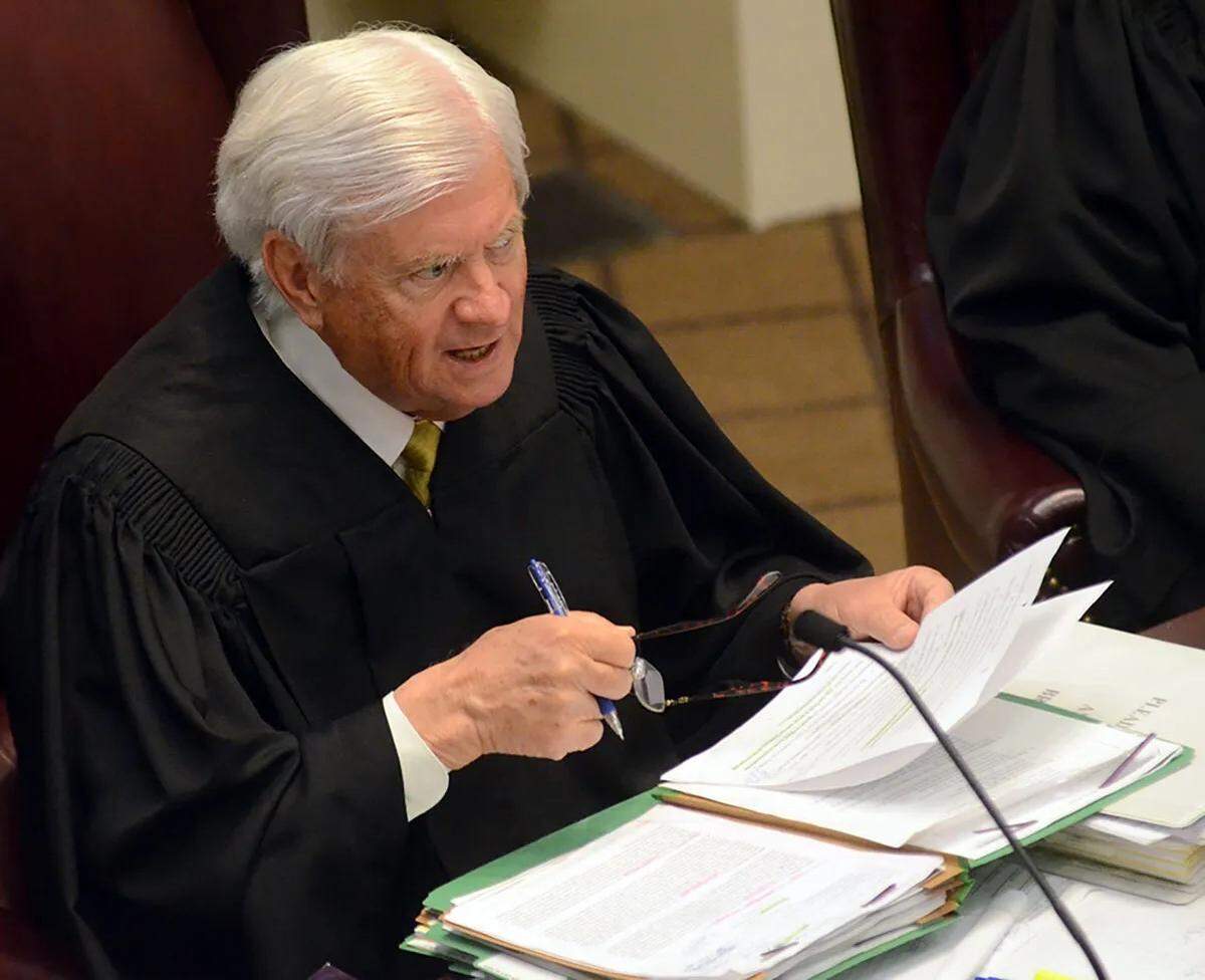 Chief Justice Michael Randolph poses a question during oral arguments in 2021 regarding Initiative 65 on medical marijuana. 