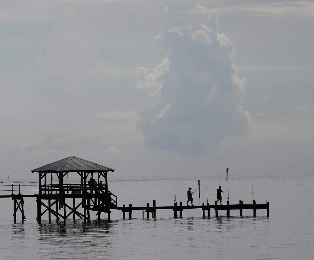 The calm before the storm at the Pass Christian harbor on Friday, May 25, 2018.