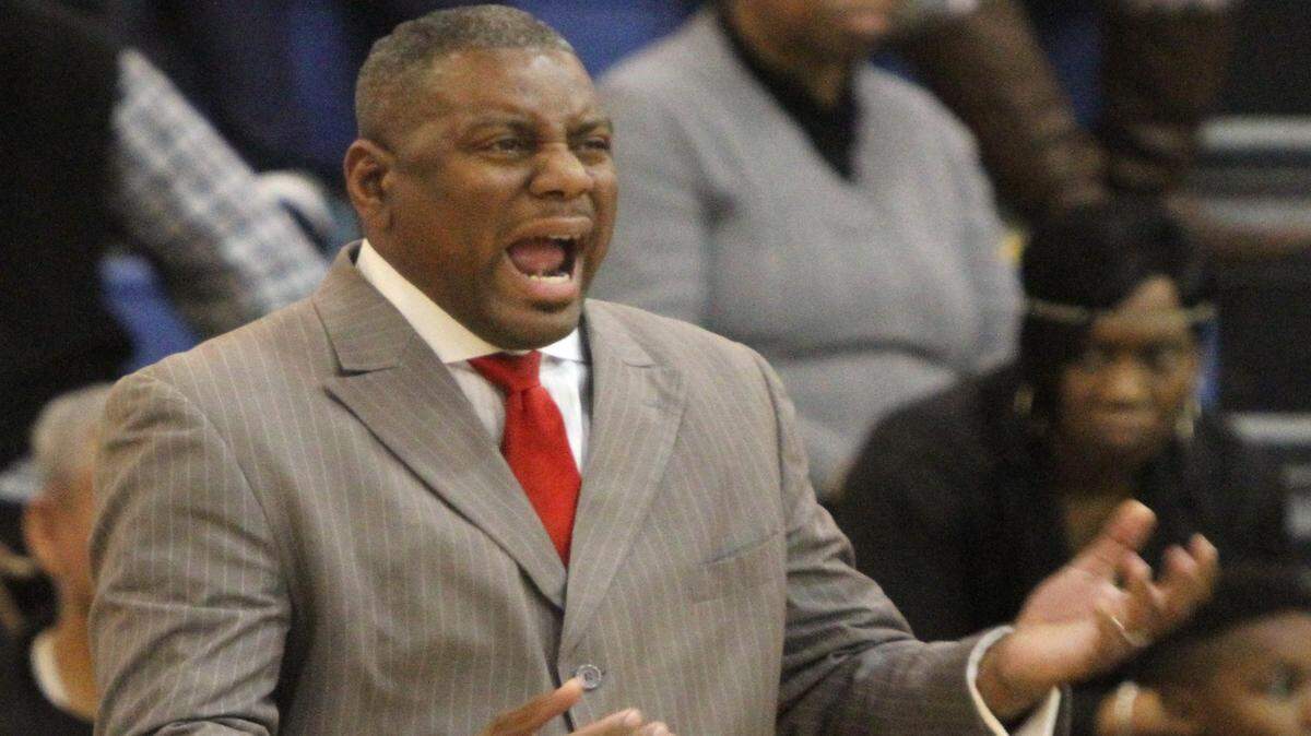 JOHN FITZHUGH/SUN HERALDHarrison Central head coach Boo Hardy yells to his players during the first quarter of their game against Gulfport at Bert Jenkins gym in Gulfport on Friday Jan. 29, 2016.