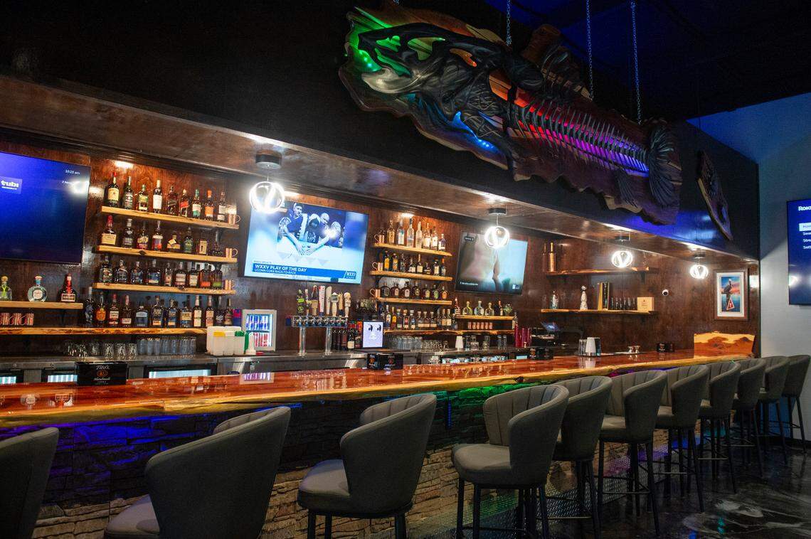 The bar area at Flatheads and Bottom Feeders in Woolmarket is tricked out with a live edge bar, several televisions, pool tables and other fun.