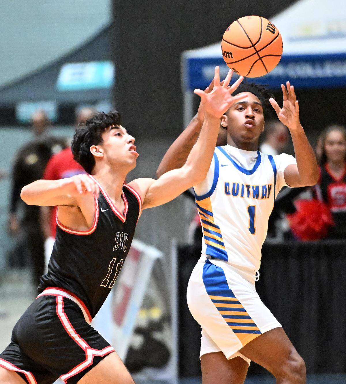 St. Stanislaus' Raphael Cohen (11) forces a Quitman turnover Saturday.