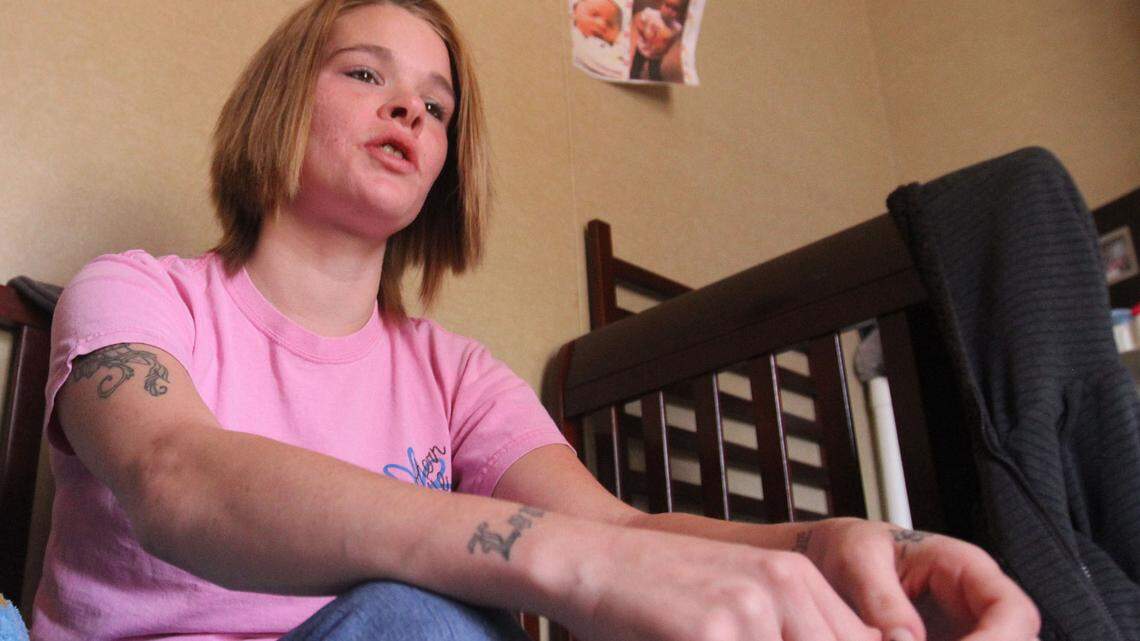 JOHN FITZHUGH/SUN HERALDMindi Stiglet of Kiln on talks Thursday Feb. 19, 2015 about how she believes a Hancock County Department of Human Services investigator forged her records.