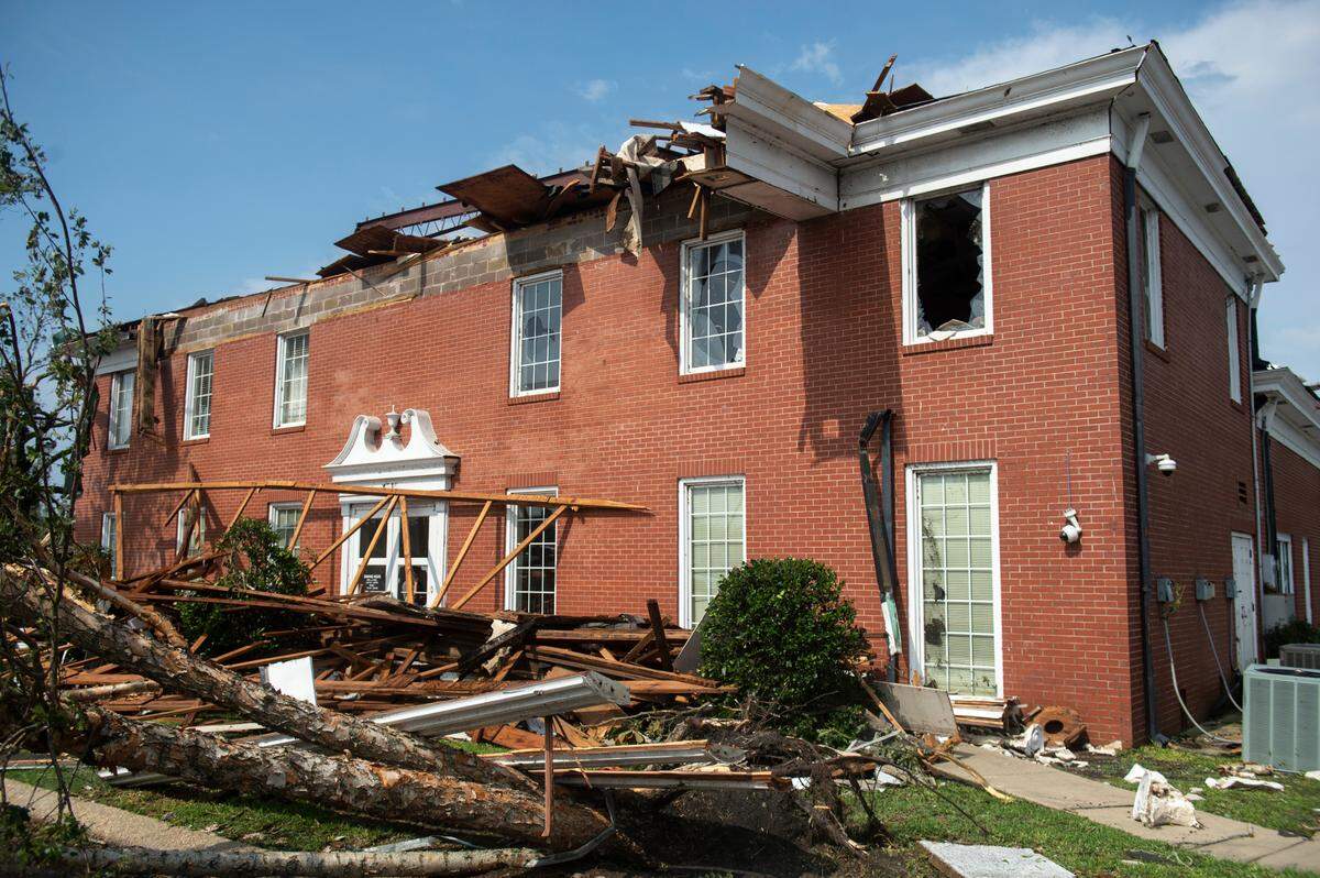 The damage outside of Merchants and Marine Bank in Moss Point on Tuesday, June 20, 2023, after a tornado damaged the building on Monday, trapping workers inside the building.