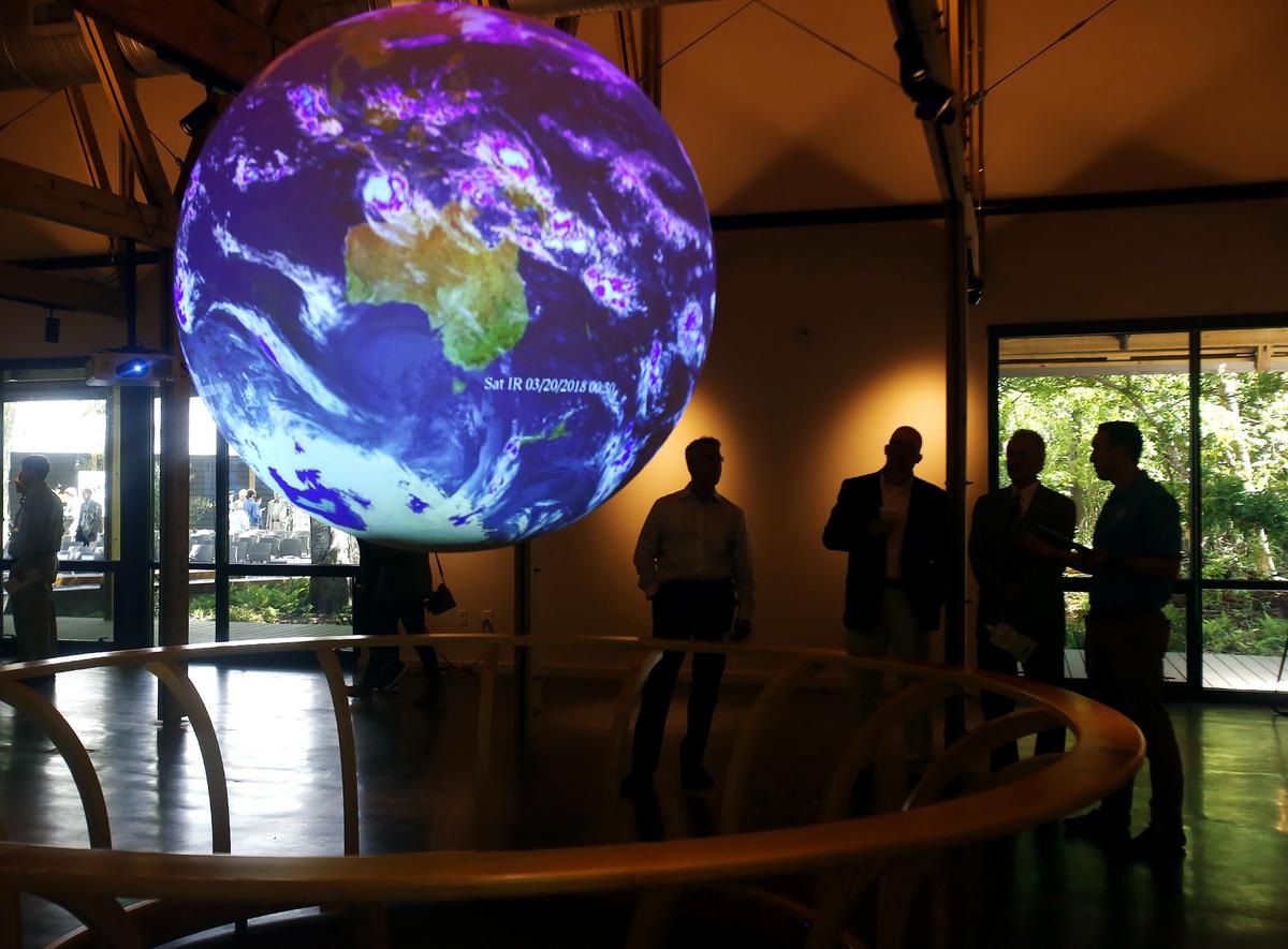 Visitors tour the new University of Southern Mississippi’s Marine Education Center at the Gulf Coast Research Laboratory Cedar Point Site on Monday, April 16, 2018. Science on the Sphere is one of the exhibits visitors can look forward to.