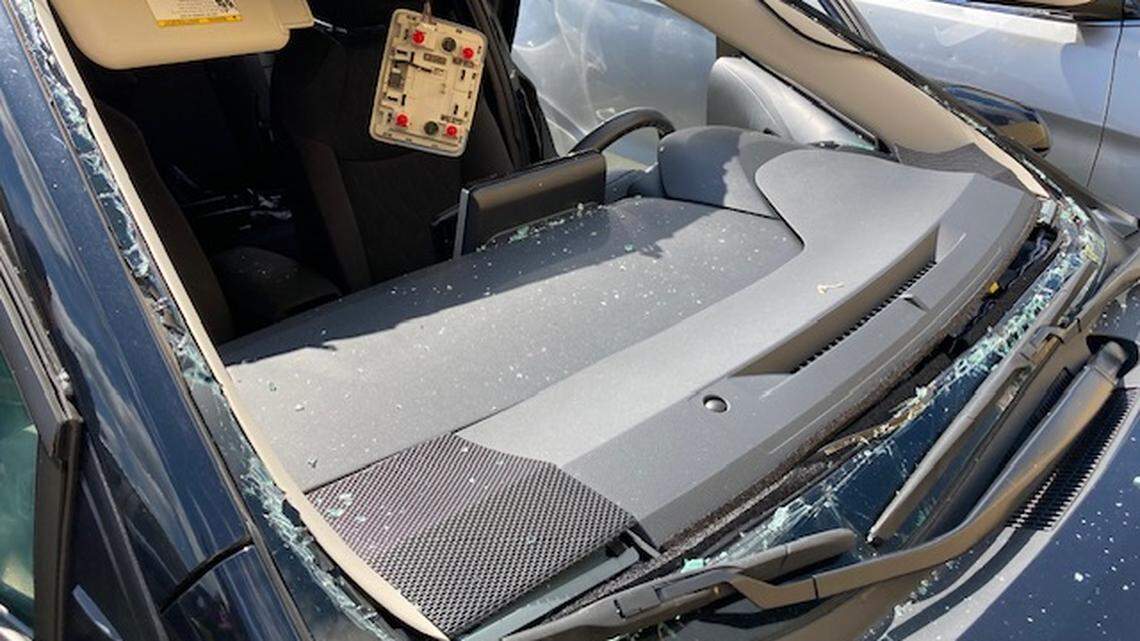 A Massachusetts woman is suspected of inhaling fumes from a compressed air can and lighting a cigarette, causing her car to explode.