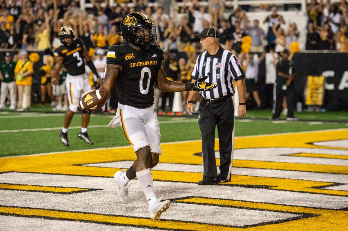 Southern Miss Golden Eagles running back Rodrigues Clark (0) scores a touchdown during a game between Southern Miss and Southeastern Louisiana at M.M. Roberts Stadium in Hattiesburg on Saturday, Sept. 7, 2024.