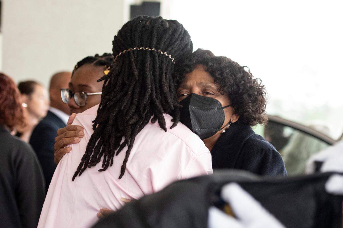 Gulfport councilwoman Ella Holmes-Hines hugs a pallbearer after Ni’Kyra Dedeaux’s funeral at Lyman Community Center in Gulfport on Friday, Jan. 10, 2025.