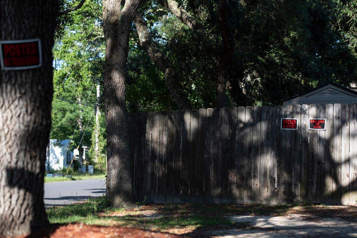 The home of a part-time Moss Point police officer whose pit bull, Trash Can, attacked 12-year-old Chris McLarty, in the Gulf Park Estates community of Jackson County on Wednesday, June 7, 2023. According to Bill McLarty, the Beware of Dog signs were posted after the dog attacked Chris a second time.