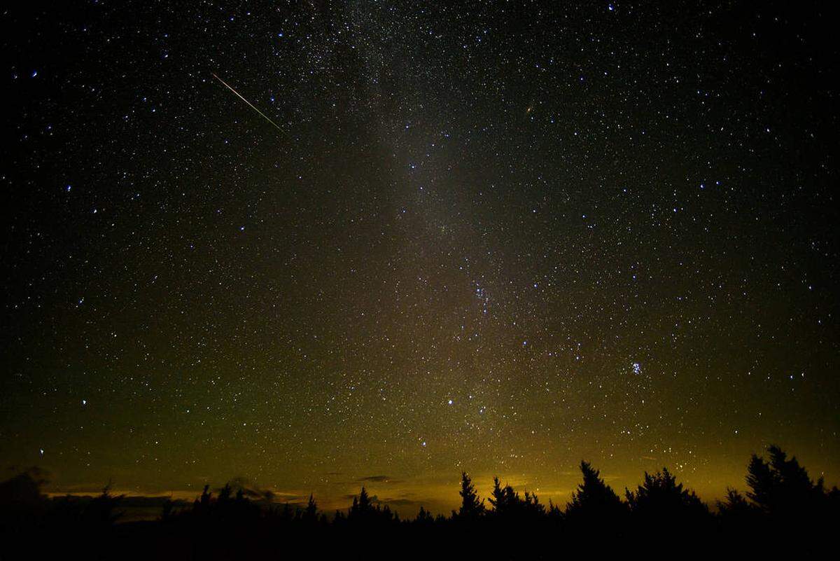 In this 30 second exposure, a meteor streaks across the sky during the annual Perseid meteor shower in August 2016 at Spruce Knob, West Virginia.