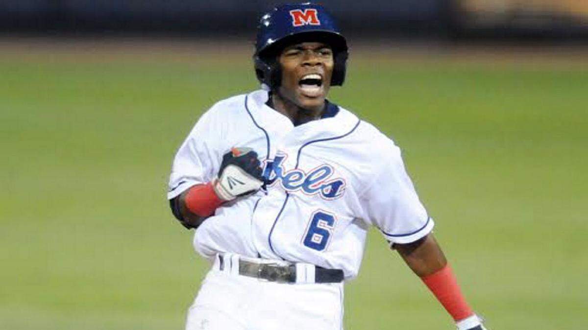 Mississippi infielder Errol Robinson (6) celebrates his RBI double in the 8th inning that broke a 3-3 tie against Mississippi State at Oxford-University Stadium in Oxford, Miss. on Thursday, May 7, 2015. Mississippi won 4-3. (AP Photo/Oxford Eagle, Bruce Newman)
