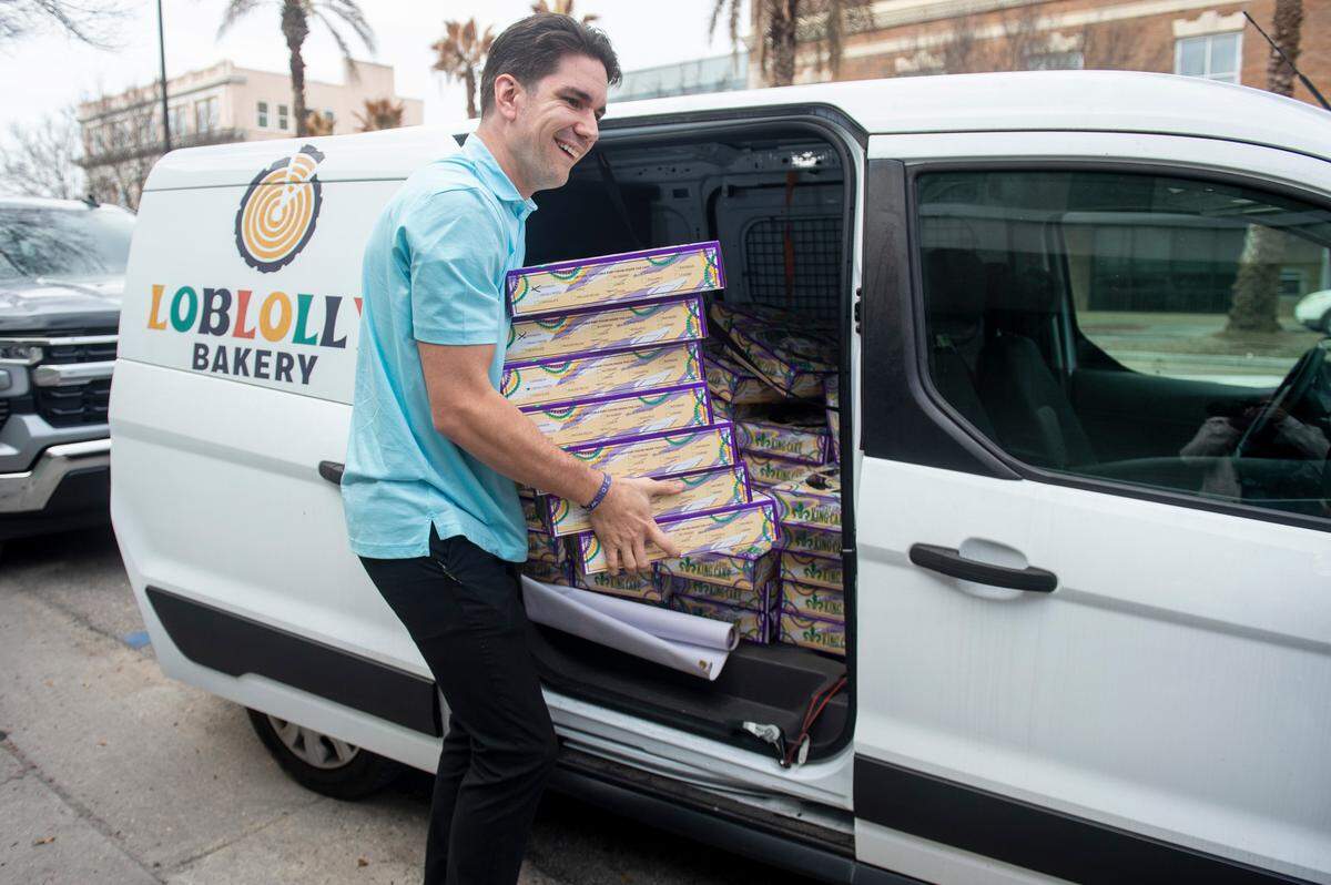 Loblolly Bakery staff unload king cakes from a truck for a pop-up sale in Gulfport on Friday, Feb. 7, 2025. The Hattiesburg-based bakery held the pop-up outside what will be The Downtowner, a new restaurant in the same restaurant group as Loblolly.