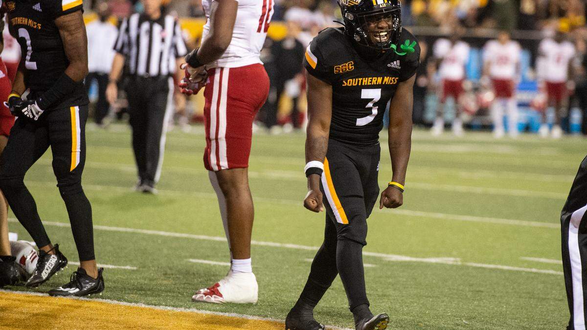 Southern Mississippi running back Frank Gore Jr. (3) celebrates after scoring during the first half of an NCAA college football game in Hattiesburg, Miss., Thursday, Oct. 27, 2022. (Hannah Ruhoff/The Sun Herald via AP)