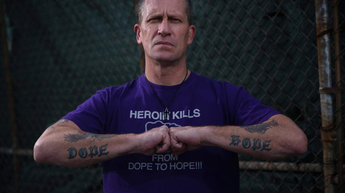 Tim Ryan, a controversial anti-heroin activist from Naperville who has created a huge following with his confrontational and profane approach, poses for a portrait on March 16, 2016 in the West Side neighborhood of Chicago. His arm tattoos read "Dope" and "Hope." (E. Jason Wambsgans/Chicago Tribune/TNS)