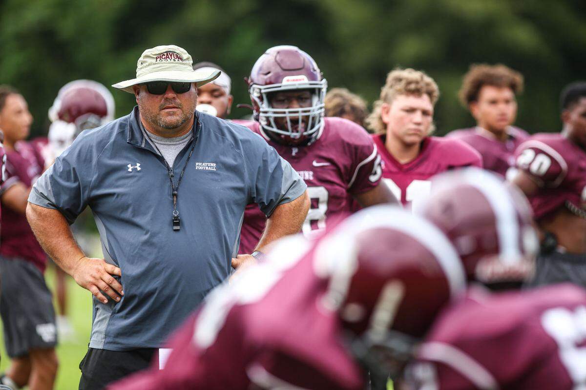 Picayune first-year head coach Cody Stogner watches drills at an afternoon practice August 20, 2020.