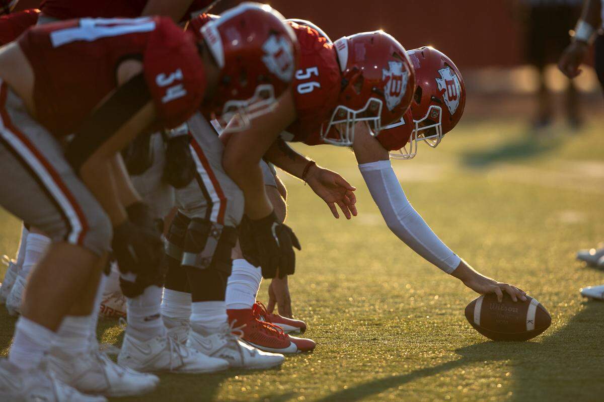 Biloxi prepares for the snap during a Jamboree game at Biloxi High School on Friday, Aug. 18, 2023.