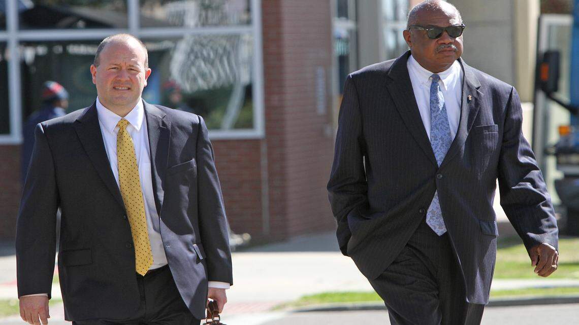 JOHN FITZHUGH/SUN HERALD 
 Business consultant Robert Simmons, right, and his attorney, K.C. Hightower, walk to the Dan M. Russell, Jr., federal courthouse in Gulfport on Thursday Feb. 18 for his initial appearance on a federal bribery charge in the public corruption case that involves former state corrections Commissioner Chris Epps and former Harrison County Supervisor William Martin.