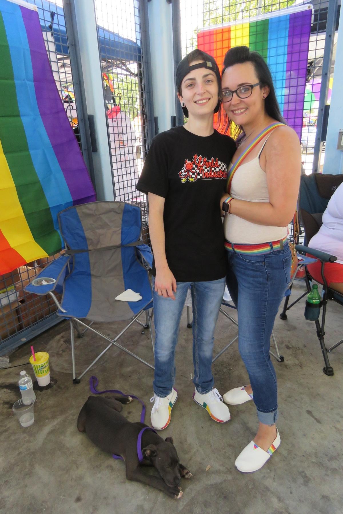 Destin Holmes and Savannah Turner attend Pride at Biloxi’s Point Cadet Plaza on June 26, 2021. They adopted their puppy, Piper, from the pet rescue booth at Pride earlier in the day.