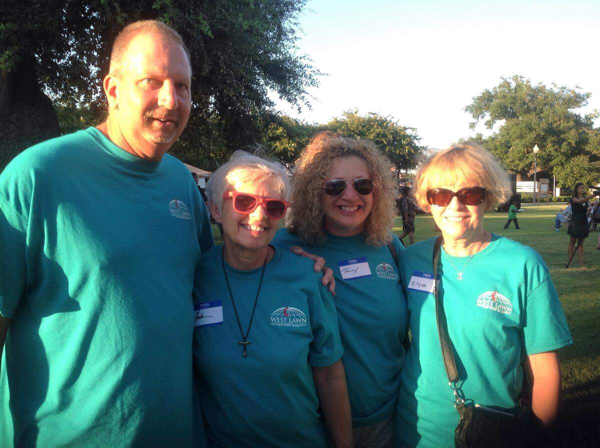 Dave Endy, left, Linda Welsh, Tammy Rank and Elyse Elliott are among 14 volunteers from West Lawn United Methodist Church in Pennsylvania in Biloxi this week building a home on the church’s 15th trip since Hurricane Katrina.They were among the volunteers honored Friday night at an event sponsored by New Life Disaster Relief at the Biloxi Town Green.