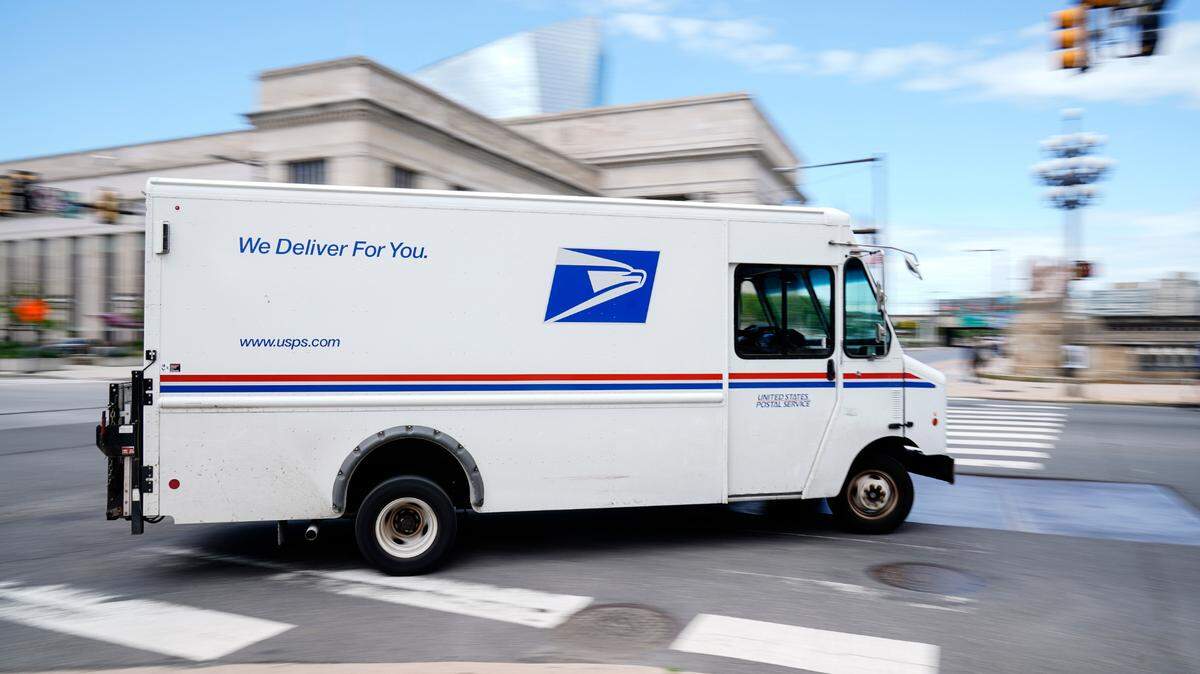 Holiday shipping deadlines are coming up soon as the U.S. Postal Service preps for the busiest week of the year. (AP Photo/Matt Rourke)