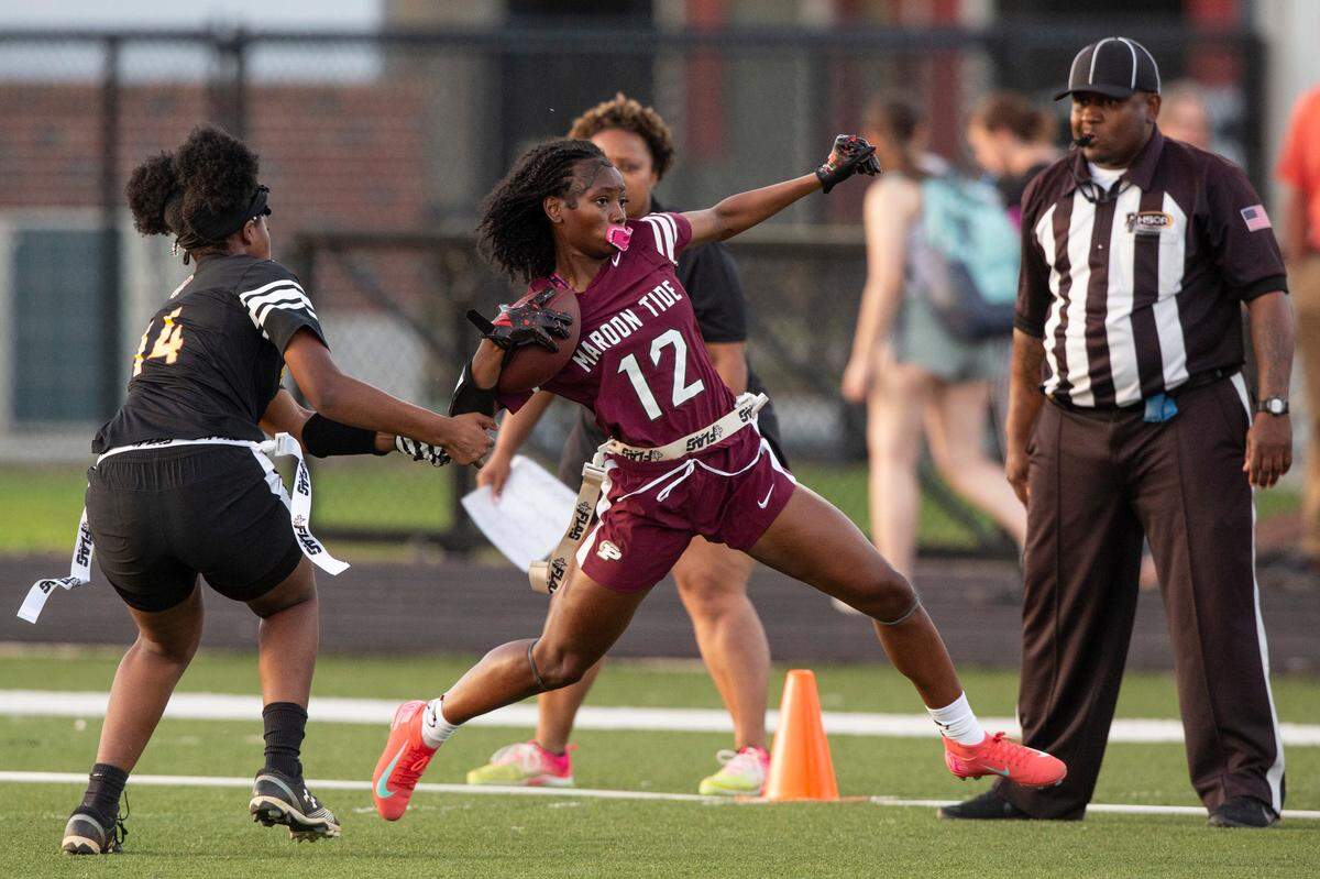 Picayune’s Ja’Niyah Ducre runs the ball during a game against Perry Central at Lee-Triplett Stadium in Picayune on Thursday, March 27, 2025.